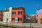 Colorful buildings with clothes hanging in canal of Burano