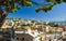 Colorful buildings on hill in city district of Genoa Genova