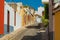 Colorful buildings on a narrow street in spanish town Garachico on a sunny day, Tenerife, Canary islands, Spain.