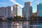 Colorful buildings and swan boats in Lake Eola Park at Orlando Downtown area.