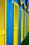 Colorful cabins and beach umbrellas by the sea