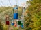 Colorful cableway cabins in autumn city park