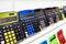 Colorful calculators on showcase in stationery store