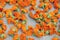 Colorful calendula blossoms on linen cloth