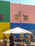 Colorful Caminito Street in La Boca neighborhood of Buenos Aires, Argentina. Vendor stand