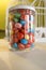 Colorful candied sweets displayed in glass jar