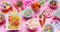 Colorful candies assortment on pink color background, closeup view