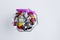 Colorful candies,chocolate balls and Turkish delight in octagonal glass bowl