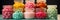 Colorful candies in glass jars and in deep plates, side view. A large assortment of sweets