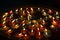 Colorful Candle floating on water for pray buddha