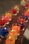 Colorful candle, praying with faith, traditional visit of a holy place, belief in God or miracle concept