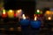Colorful candles with fire in a catholic cathedral