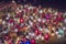 Colorful candles stand side by side, light of memory