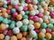 Colorful candy cereal sugar balls background