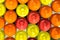 Colorful candy onbackground with  yellow, orange and pink sweetmeats candies. Dolce vita