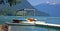 Colorful Canoes on Dock of Mountain Lake