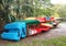 Colorful Canoes, Kayaks and Boats in the Rack Waiting for Advent