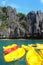 Colorful canoes on a lagoon, island of Palawan, the Philippines