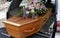 A colorful casket in a hearse or church before funeral