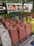 Colorful ceramic vases on shelves of store