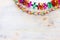 Colorful chain garland over white wooden background. Traditional jewish sukkot holiday decoration