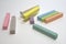 colorful chalks for kids creativity and simple drawing. scattered