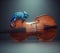 A colorful chameleon sits on a violin