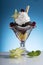 Colorful cherry Sundae with wipping cream and Carambola decorate