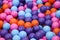 Colorful child balls. Multi-colored plastic balls. A children`s playroom. Background texture of multi-colored plastic balls on th