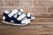 Colorful child sandals on wooden background