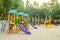 Colorful children playground activities in public park. Safe modern children`s playground