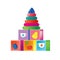 Colorful children`s toys. Children`s developing cubes with illustrations, colored pyramid.