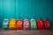 Colorful children schoolbags on a wooden floor, blue room backdrop