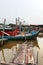 Colorful chinese fishing boat resting at a Chinese Fishing Village, Sekinchan, Malaysia