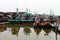 Colorful chinese fishing boat resting at a Chinese Fishing Village, Sekinchan, Malaysia