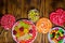 Colorful chocolate candies, lollipops and jelly sweets on wooden table