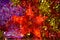 Colorful Christmas background with a star to decorate the New Year and Christmas tree and multi-colored tinsel. The concept of Chr