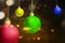 Colorful Christmas ball hanging with a colored background