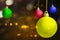 Colorful Christmas ball hanging with a colored background