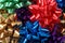 Colorful Christmas bows forming a vivid background