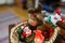 Colorful Christmas plush animals and snowman toys in a wooden basket