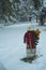 Colorful Christmas Snowman outside in snow