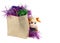 Colorful Christmas tinsel in a paper bag.Soft toy bull-a symbol of the coming year.