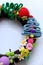 Colorful Christmas wreath handmade ornament for garland from pine tree, flower, fruit, leaf, wonderful craft decoration