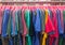 colorful clothes hanging for sale, discounted prices on every major holiday