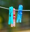 Colorful clothespin hanging on a rope