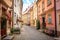Colorful cobblestone street in a historical European street.