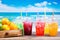 Colorful cold drinks in plastic cups on the beach