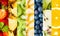Colorful collage of assorted tropical fruit