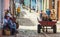 Colorful Colonial ancient town with classic carriage, farmer, cobblestone street in Trinidad, Cuba, America.